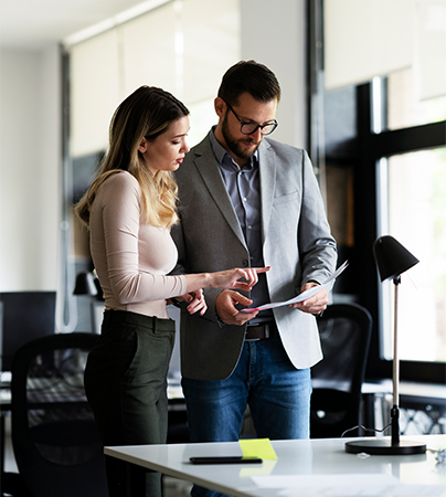 Two people talking in a business meeting